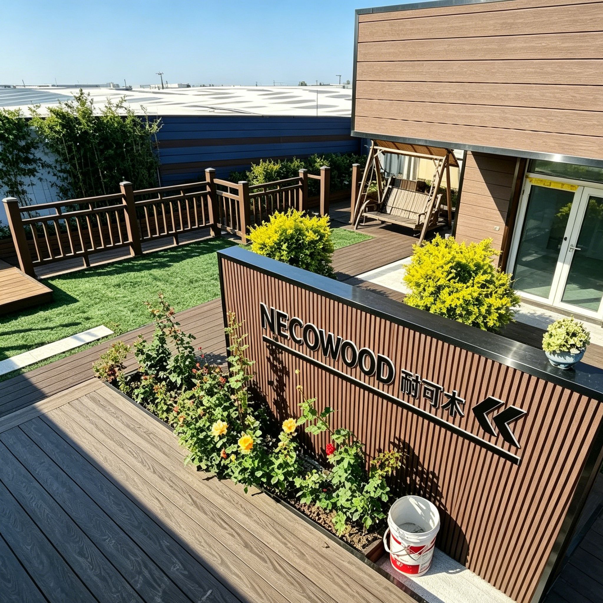 Full view of NECOWOOD showroom: decking, planters and facade unified style
