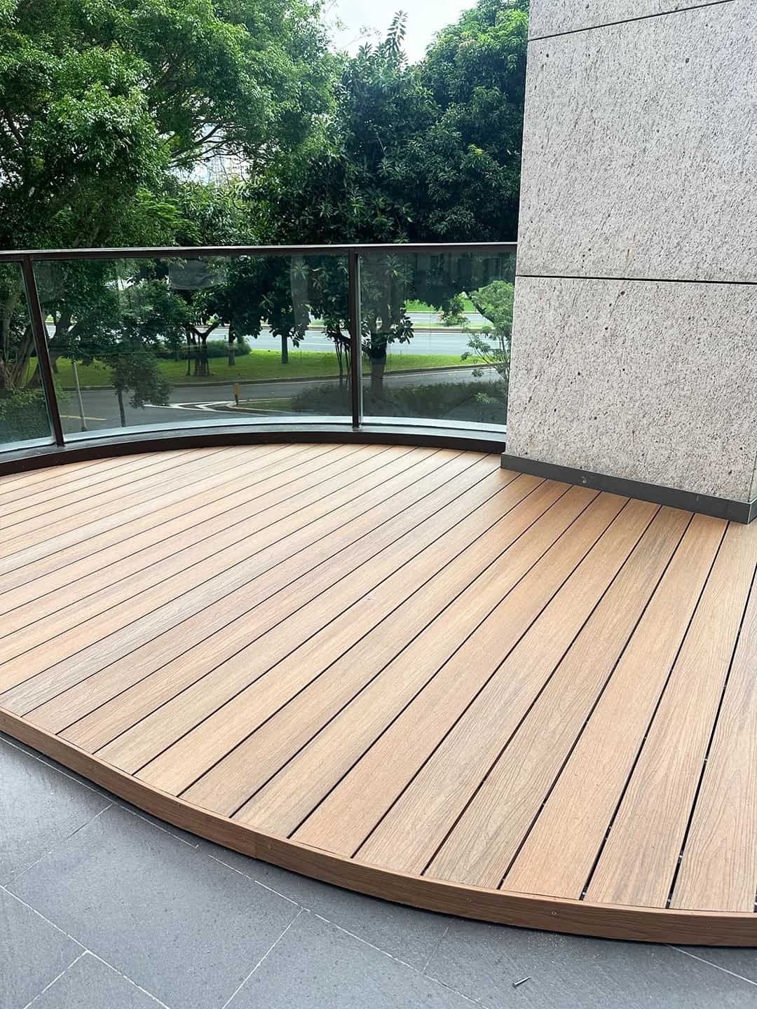 Necowood curved deck platform blending with garden landscape